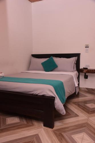 Ένα ή περισσότερα κρεβάτια σε δωμάτιο στο Hotel SAMAI