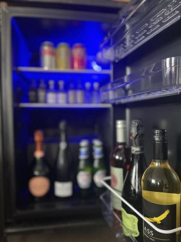 a refrigerator filled with lots of bottles of wine at The Baltic Hotel in Liverpool