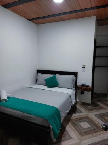 Ένα ή περισσότερα κρεβάτια σε δωμάτιο στο Hotel SAMAI