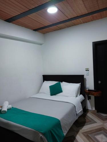 Ένα ή περισσότερα κρεβάτια σε δωμάτιο στο Hotel SAMAI