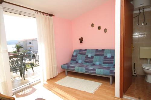 Posezení v ubytování Triple Room Pasman 8223e