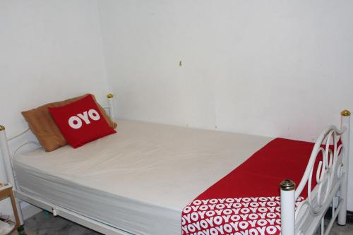 Voodi või voodid majutusasutuse OYO 985 The Twins Hostel toas