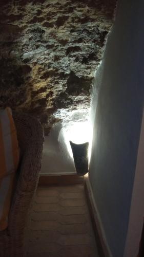 a view of the ocean from a room with a stairway at CASA ENROCADA in Setenil