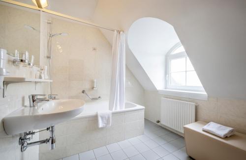Koupelna v ubytování Hotel am Mirabellplatz