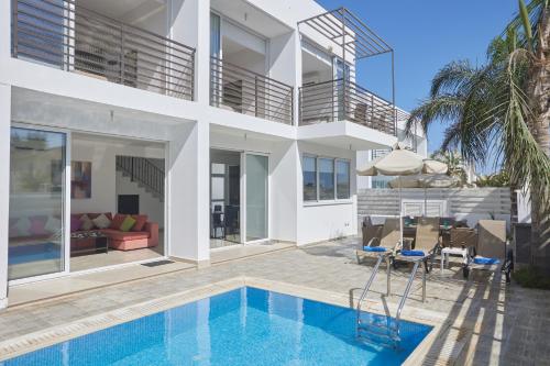 Piscina a Pearl Villas o a prop