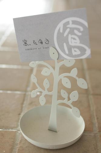 a small paper tree with a sign on it at Seashore My Home in Eluan