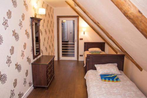 Postel nebo postele na pokoji v ubytování Kalurikodu Holiday Home