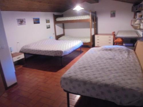 Krevet ili kreveti u jedinici u okviru objekta Locanda Montegiovi
