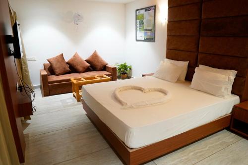Postel nebo postele na pokoji v ubytování Aranya Jungle Resorts