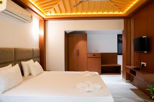 Postel nebo postele na pokoji v ubytování Aranya Jungle Resorts