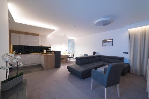 Η κουζίνα ή μικρή κουζίνα στο Apart-Hotel VIVI RESIDENCE & SPA