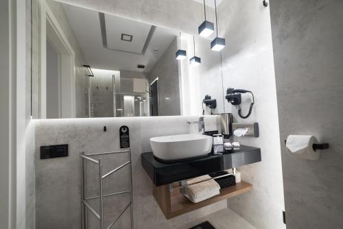Ένα μπάνιο στο Apart-Hotel VIVI RESIDENCE & SPA