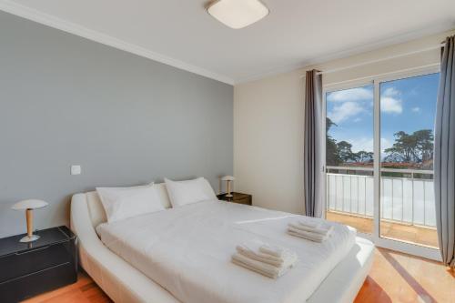 Ένα ή περισσότερα κρεβάτια σε δωμάτιο στο Boeiro I