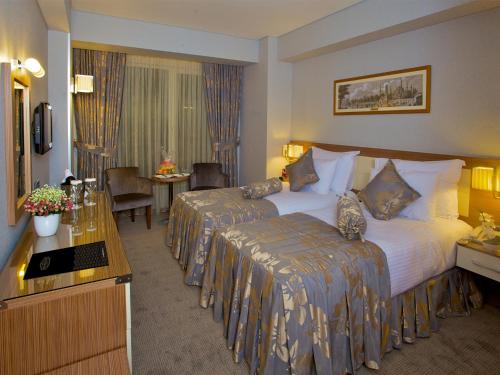 Кровать или кровати в номере Hotel Momento - Special Category