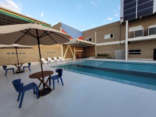 Πισίνα στο ή κοντά στο Hotel Cruzeiro Tacaimbó