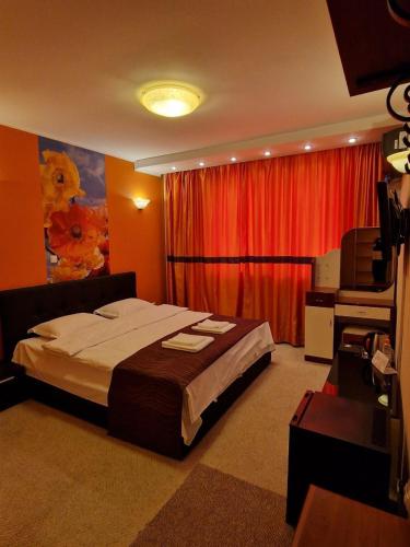 Кровать или кровати в номере Francesca Residence