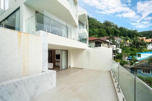 an empty balcony of a house with a view at seaview villa private swimming pool in Karon Beach