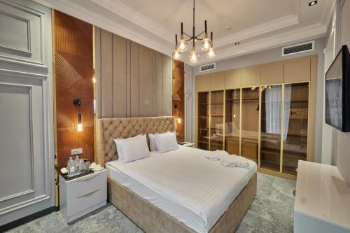 Кровать или кровати в номере Continental Hotel Samarkand