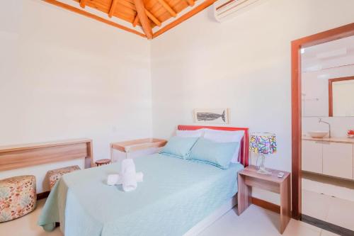 Postel nebo postele na pokoji v ubytování IT27 Village 3 Suítes, Pé na Areia - Itacimirim