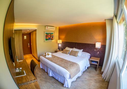 Katil atau katil-katil dalam bilik di Hotel Refugio da Montanha