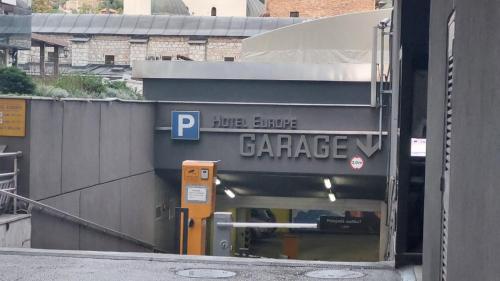 a entrance to a garage in a building at Apartments Artee Free Garage Parking in Sarajevo