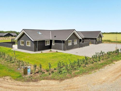 an image of a house with a driveway at Luxury Retreat by Limfjorden - By Traum Ferienwohnungen in Spottrup