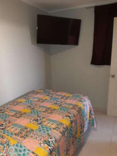 Ein Bett oder Betten in einem Zimmer der Unterkunft Hostal D' Silvia