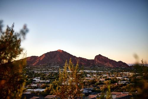 a view of a city with a mountain in the background at Sanctuary Camelback Mountain Resort and Spa in Scottsdale