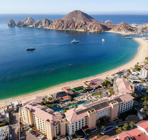 an aerial view of a beach and the ocean at Casa Dorada Los Cabos Resort & Spa in Cabo San Lucas