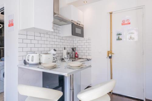 Dapur atau dapur kecil di Ma Douceur Paris La Défense