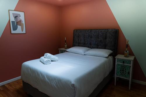 Postel nebo postele na pokoji v ubytování Next Door