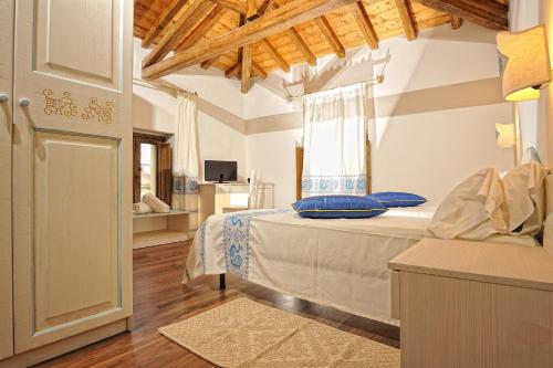 Una cama o camas en una habitación de Hotel Antica Posada