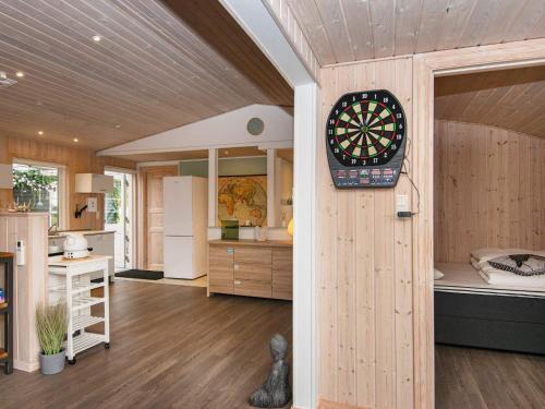 a room with a dart board on the wall at 6 person holiday home in Struer-By Traum in Struer