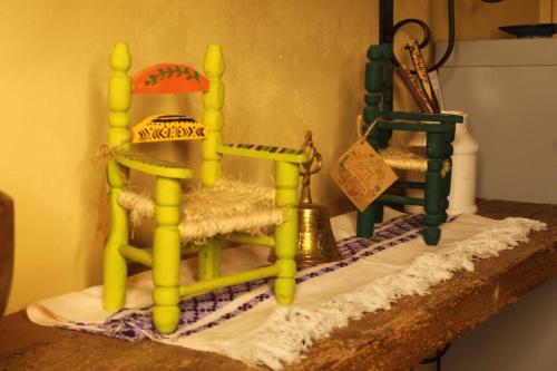 a cake on top of a counter with a toy at Rustic Luxury Retreat Near Historic Zacatlan in Zacatlán