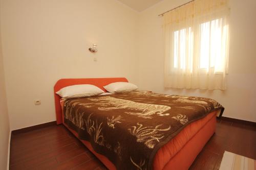 Ένα ή περισσότερα κρεβάτια σε δωμάτιο στο Apartments by the sea Kraj, Pasman - 331