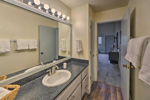 a bathroom with a sink and a large mirror at Modern Ketchum Condo Walk to Dtwn and Ski Lift in Ketchum