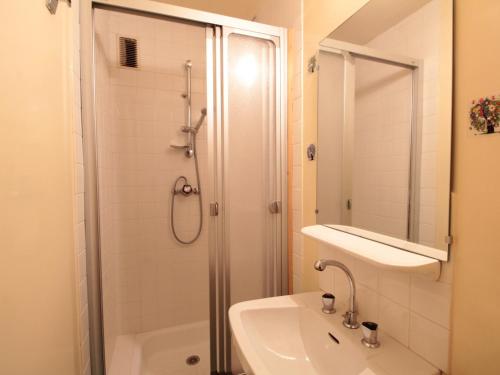 a white bathroom with a shower and a sink at Appartement Flaine, 3 pièces, 8 personnes - FR-1-687-83 in Arâches-la-Frasse