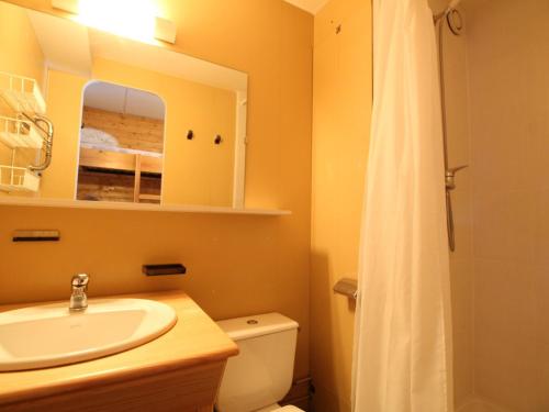 a bathroom with a sink and a toilet and a shower at Studio Flaine, 1 pièce, 4 personnes - FR-1-687-73 in Arâches-la-Frasse