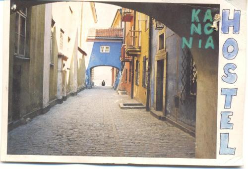a street scene with a street sign and a building at Old Town Kanonia Hostel & Apartments in Warsaw