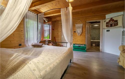 a bedroom with a bed and a large window at Gorgeous Home In Brod Na Kupi With Wifi in Brod na Kupi