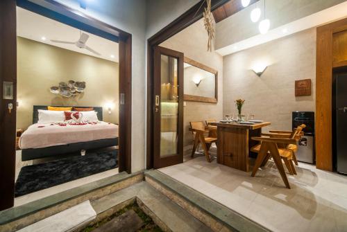 Ένα ή περισσότερα κρεβάτια σε δωμάτιο στο Umaliplip Villa Canggu