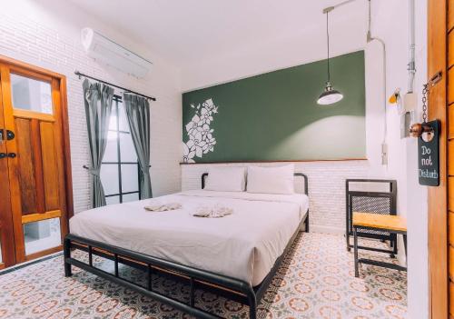 Postel nebo postele na pokoji v ubytování V1 Room Hotel