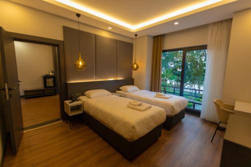 Voodi või voodid majutusasutuse SANTANA OTEL toas