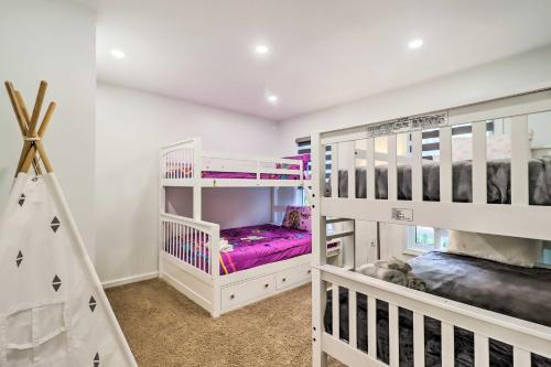 a room with two bunk beds and a ladder at Game Room and Yard Family Paradise in Pocono Summit in Pocono Summit Estates