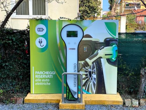a sign with a snowboard on the side at Hotel Torino Wellness & Spa in Diano Marina