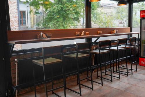 Hotel Ticiani 15にあるレストランまたは飲食店