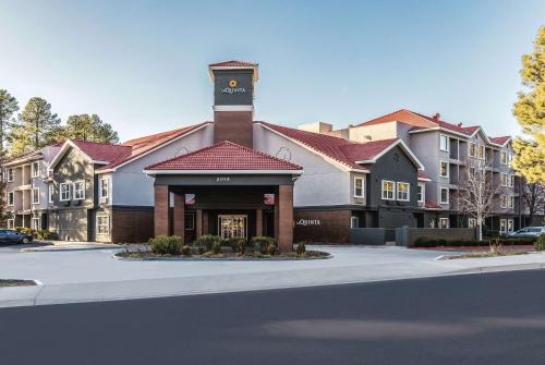 a building with a clock tower on top of it at La Quinta by Wyndham Flagstaff in Flagstaff