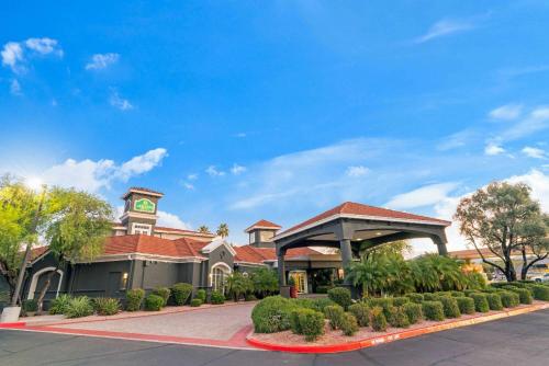a building with a clock tower on top of it at La Quinta by Wyndham Phoenix Scottsdale in Scottsdale