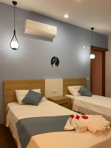Voodi või voodid majutusasutuse Mirena Apart toas