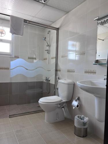 Ванная комната в AL MANAF HOTEL SUITES